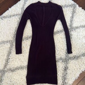 Kaisely Wool dress with open back.